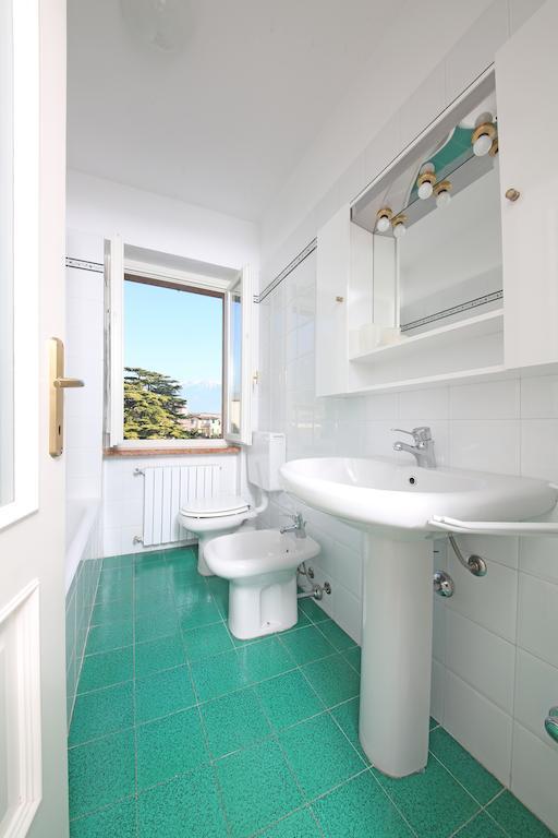 Apartment Casa Caterina Гарньяно Номер фото